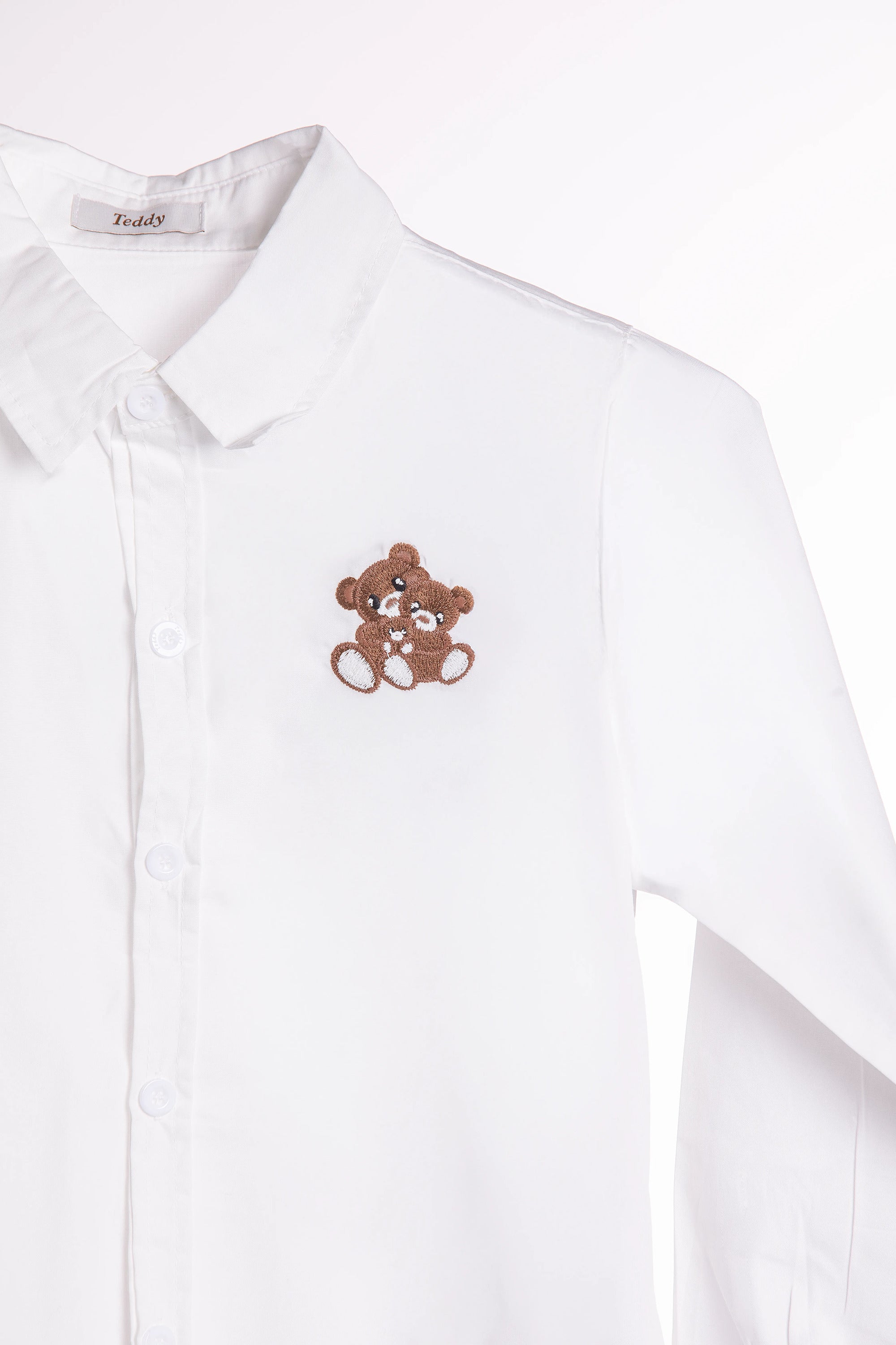 قميص أبيض ولادي